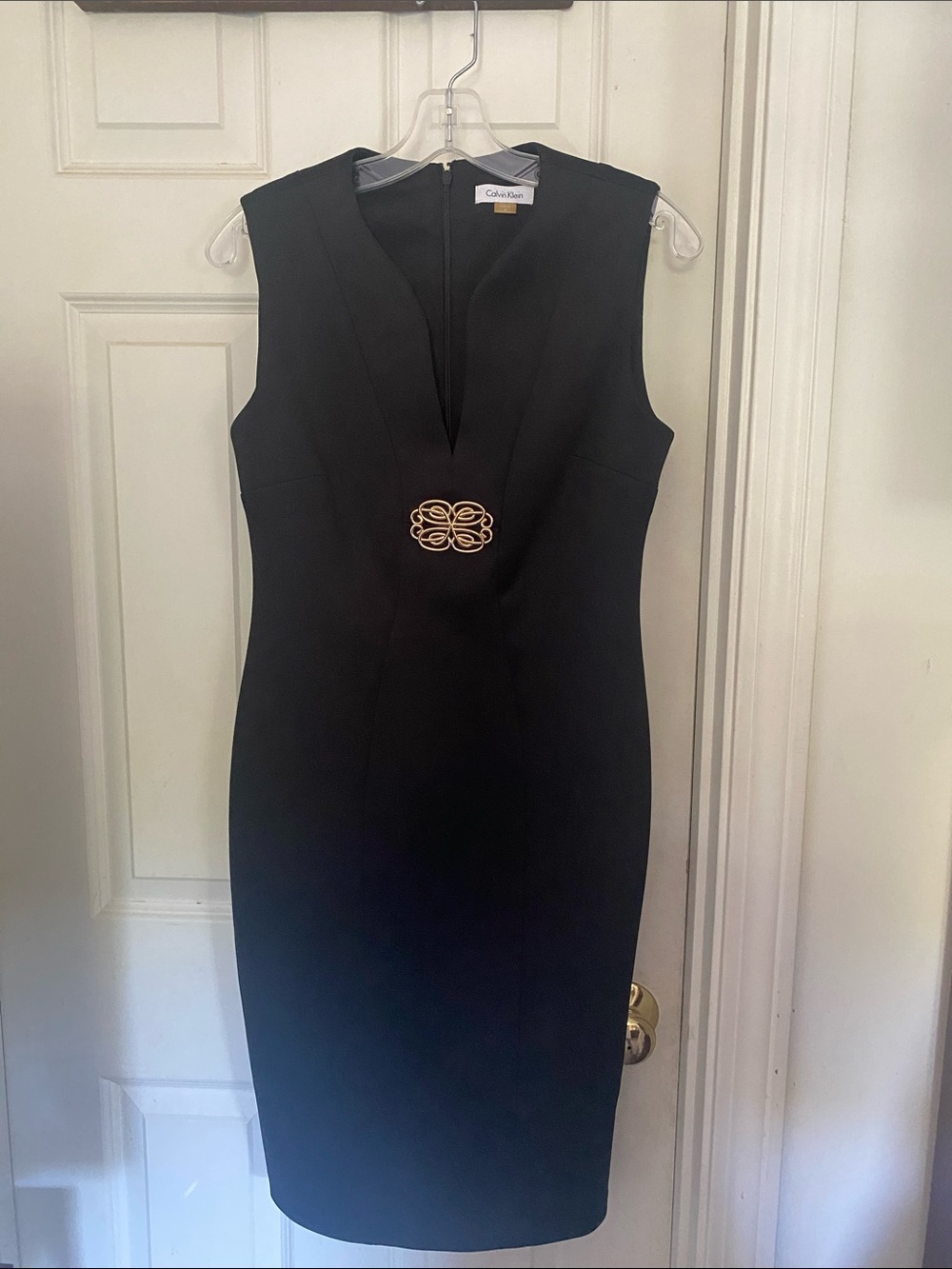 Calvin Klein Black Sleeveless Sheath Dress with Gold Medallion